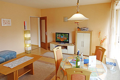 Appartement 12a: Wohnzimmer mit Essecke