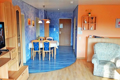 Appartement 49: Wohnzimmer mit Essecke